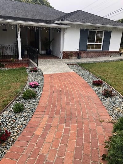 Exterior view of the Arlington Care Home entrance with pathway.