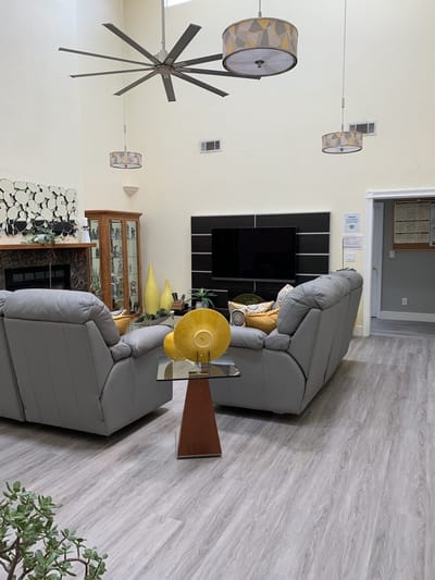 Bright common area with comfortable seating and decor