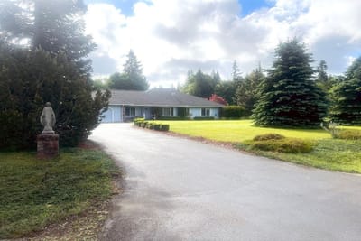 Exterior view of Canterwood Estates with landscaping