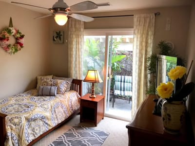 Cozy resident room with a bed and natural light