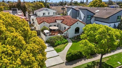 Aerial view of a senior living facility surrounded by greenery