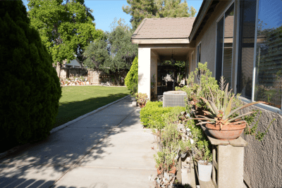 Pathway leading to a building with landscaped areas