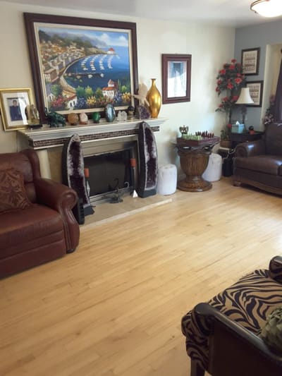 Cozy living area with a fireplace and artwork