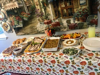 A table set with a variety of foods for a gathering