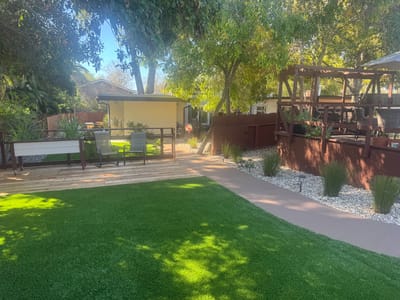 Well-maintained outdoor space with seating area