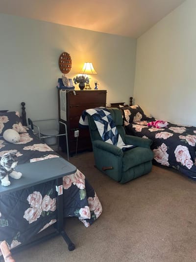 Cozy private resident room with floral decor