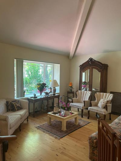 Cozy common area with seating and natural light