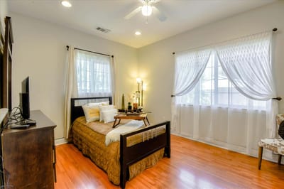 Cozy resident room with warm lighting and decor