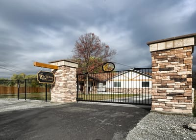 Entrance gate of By the River Assisted Living facility
