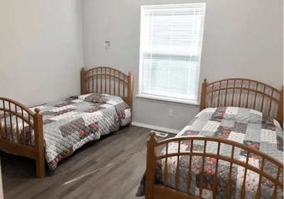A shared resident room with two beds