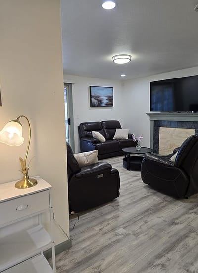Cozy lounge area with seating and a TV
