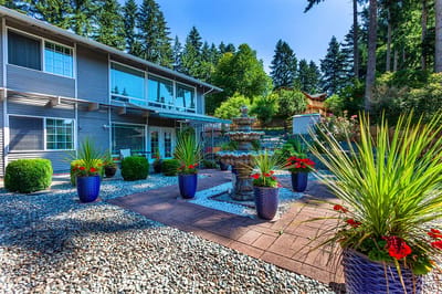 Beautiful outdoor space with fountain and flower pots