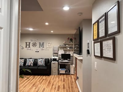 Cozy interior with seating area and decorative wall art