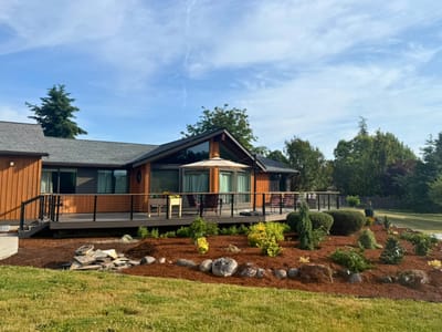 Exterior view of Wisteria Lodge with landscaped garden