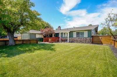 Outside view of Bancroft Villa with a green lawn
