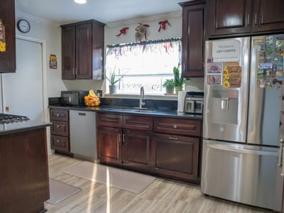Bright kitchen area with fruits and decorations