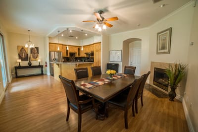 Dining area with table and chairs in a warm space