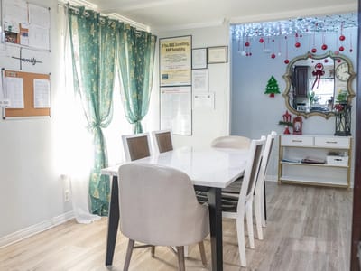 Bright dining room with a table and chairs