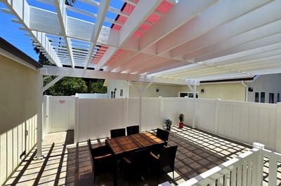 Outdoor patio area with table and seating