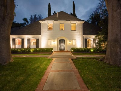 Exterior view of a well-lit residential building