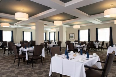 Dining room set up with tables and chairs
