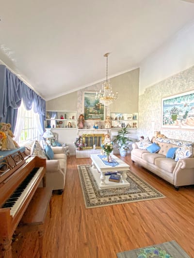 Comfortable common area with sofas and a piano