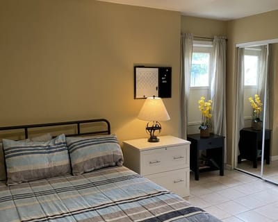 Cozy private bedroom with a bed and decor