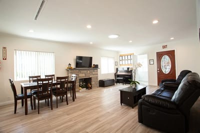 Interior common area with seating and dining table