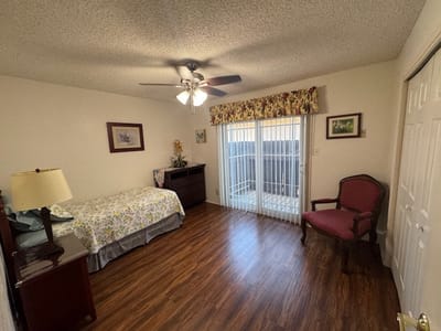 Cozy private room with a bed and seating area