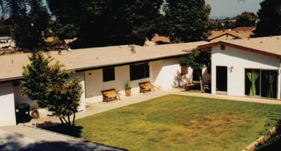 View of the exterior and courtyard of Country Rose Estate