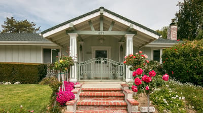 Entrance of a charming facility with flowers