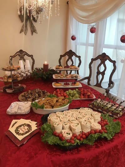 A beautifully arranged dining table with festive food for residents