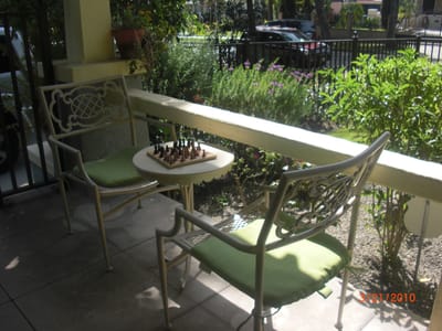 Outdoor seating area with a chess set