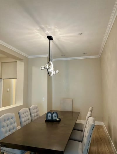 Elegant dining area with modern lighting