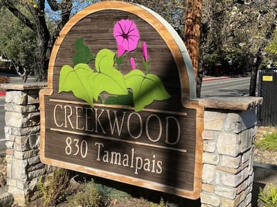 Facility signage displaying the name Creekwood