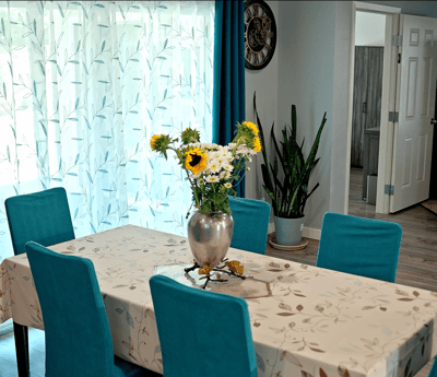 Interior dining area with a floral centerpiece