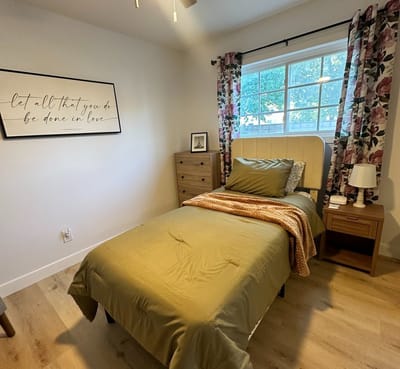 Cozy private resident room with a bed and decor