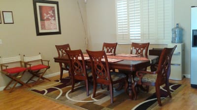 Common area with a dining table and chairs