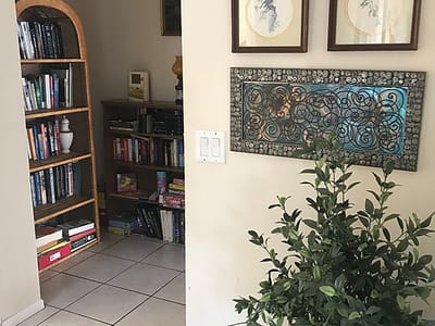 Interior view of a cozy reading area with shelves