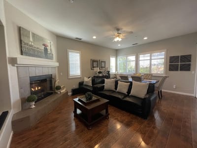 Bright common area with comfortable seating and decor