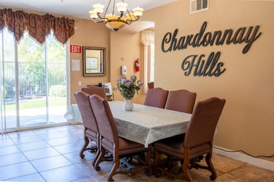 Dining area with a table and chairs in a facility