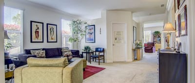 Comfortable common area with seating and art decor