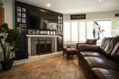 Cozy interior common area with a fireplace and seating