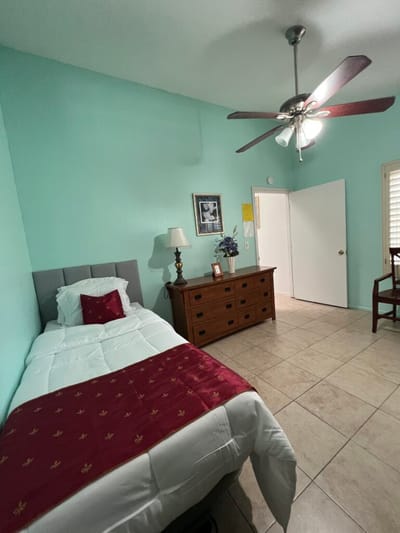 Private resident room with a bed and furniture