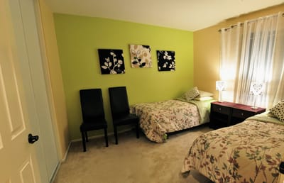 Cozy shared resident room with floral bedding