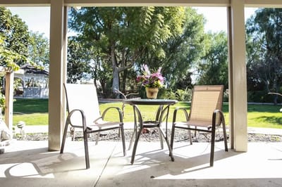 Outdoor seating area with table and chairs
