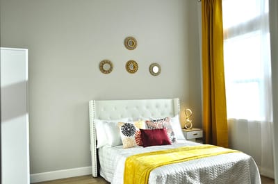A cozy interior bedroom with decorative elements