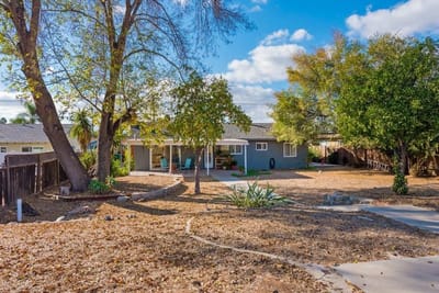 Exterior view of El Cajon Senior Care Home with landscaping
