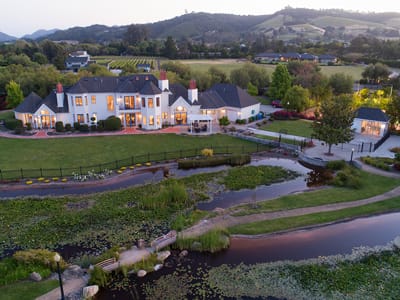 Aerial view of Edna Rose Residence and surrounding landscape