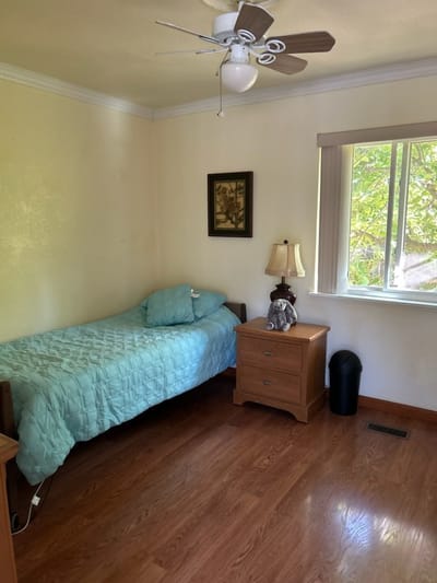 Cozy resident room with a bed and window